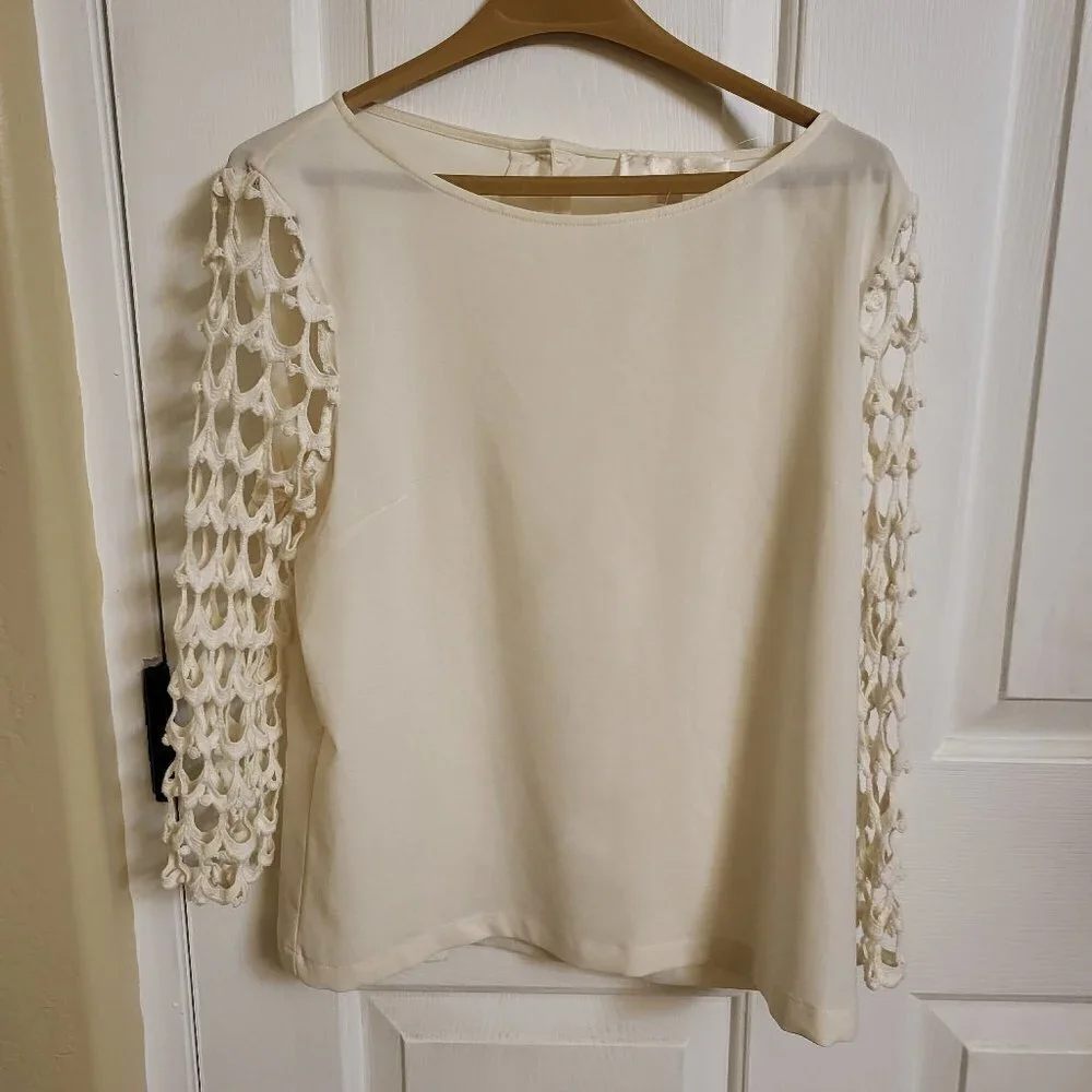 Lumiere Cream colored blouse with lace sleeves and buttoned SIZE MEDIUM